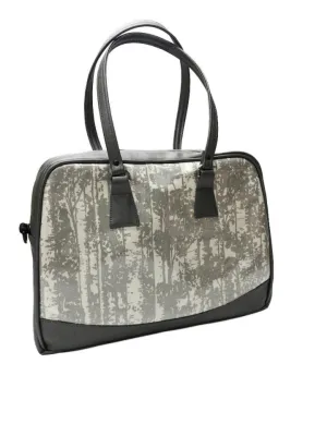 Briefcase in silver trees